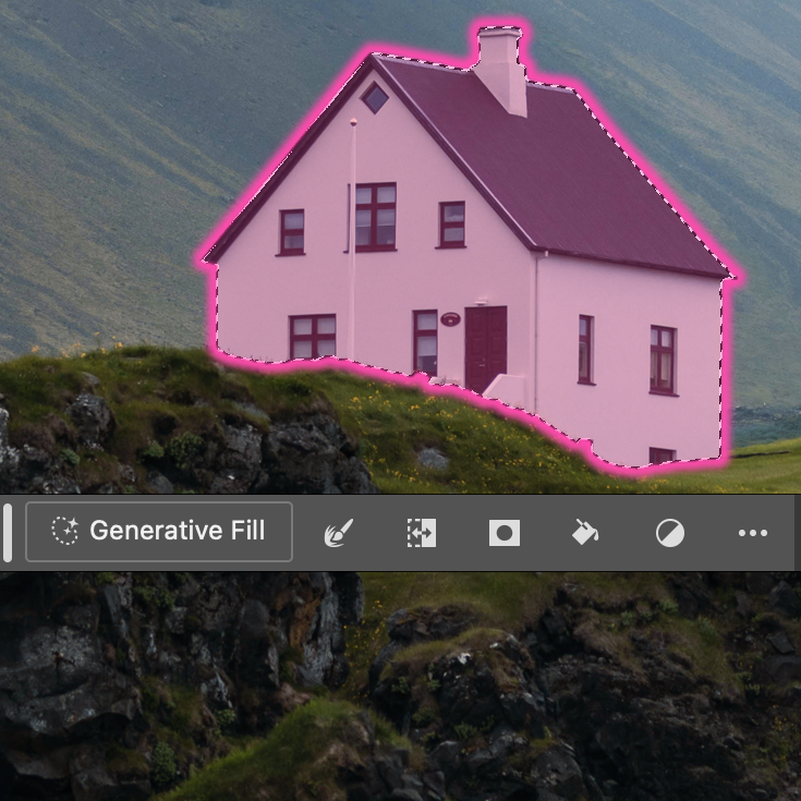 photo d'une maison rose sur une montagne sombre